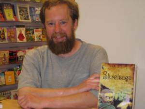 Steve Parker looking pretty satisfied next to his book, Skrelsaga.  He lives to autograph!